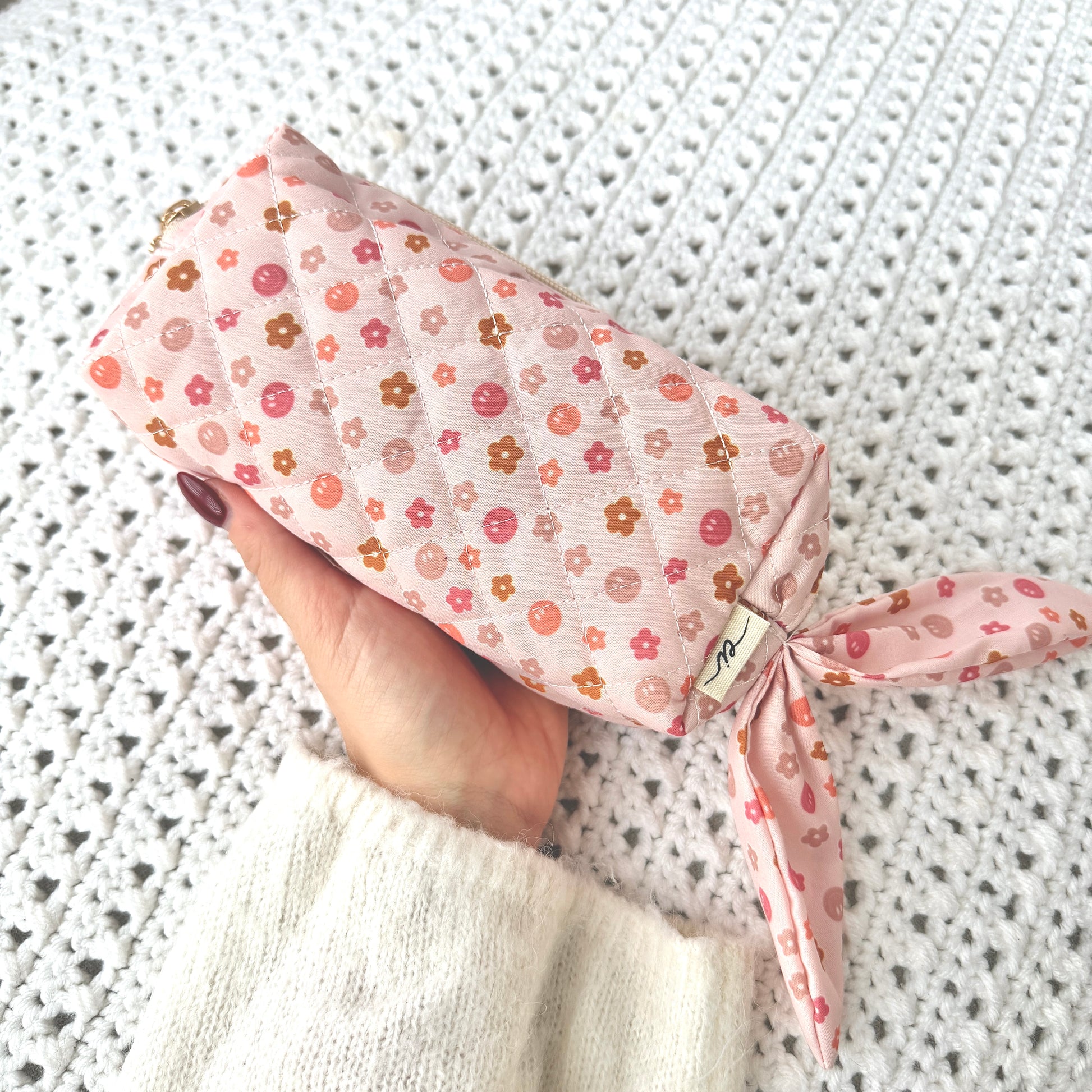Trousse (Sourires et fleurs neutres)